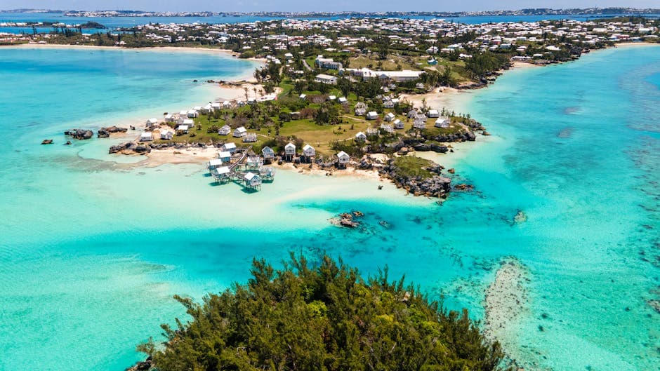 Aerial view of Bermuda's turquoise coastline, one of the three points of the Bermuda Triangle