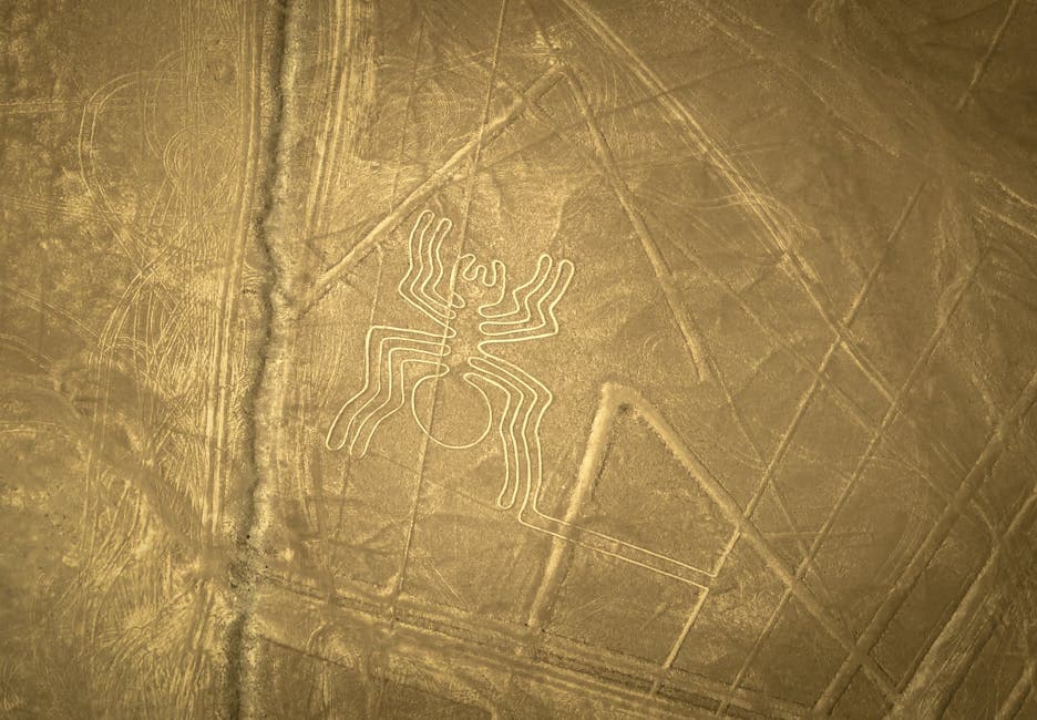Aerial photograph of the Nazca Lines spider geoglyph etched into the Peruvian desert