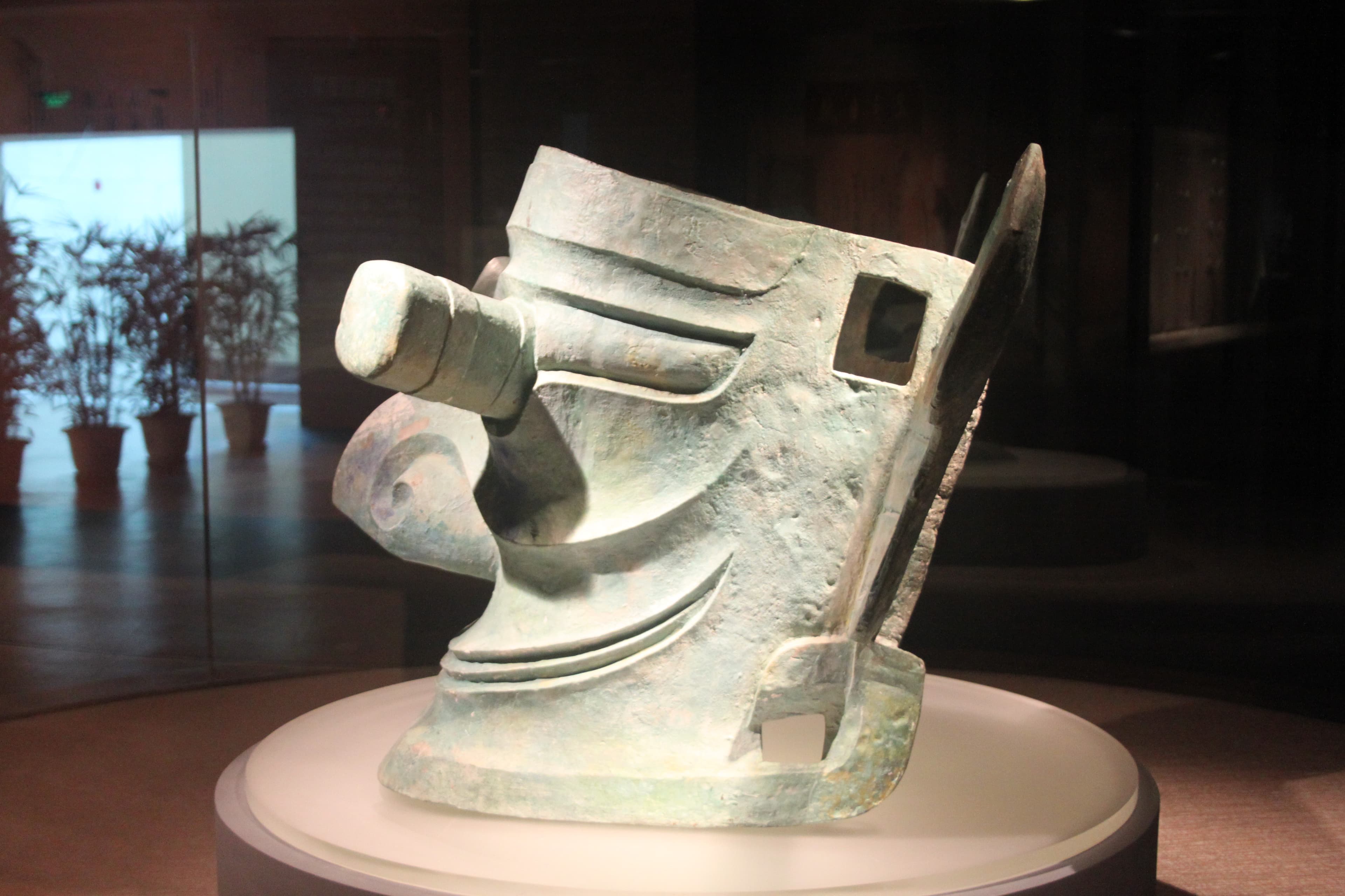 A bronze Sanxingdui mask with cylindrical protruding eyes and outstretched ears