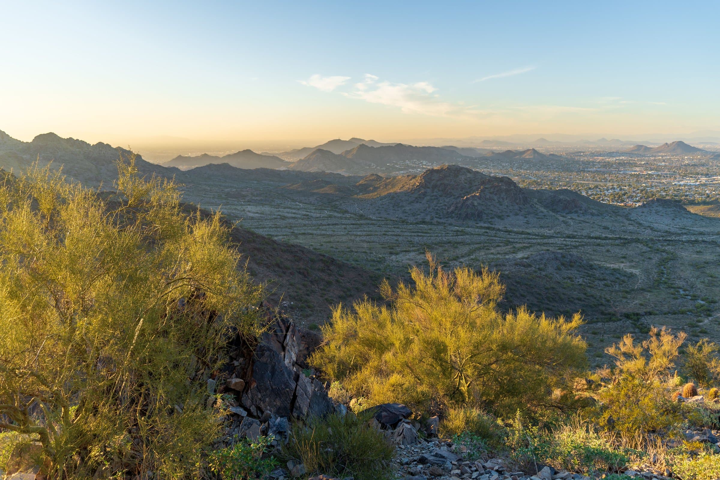 Late-afternoon light over the rugged high desert scrubland of central New Mexico