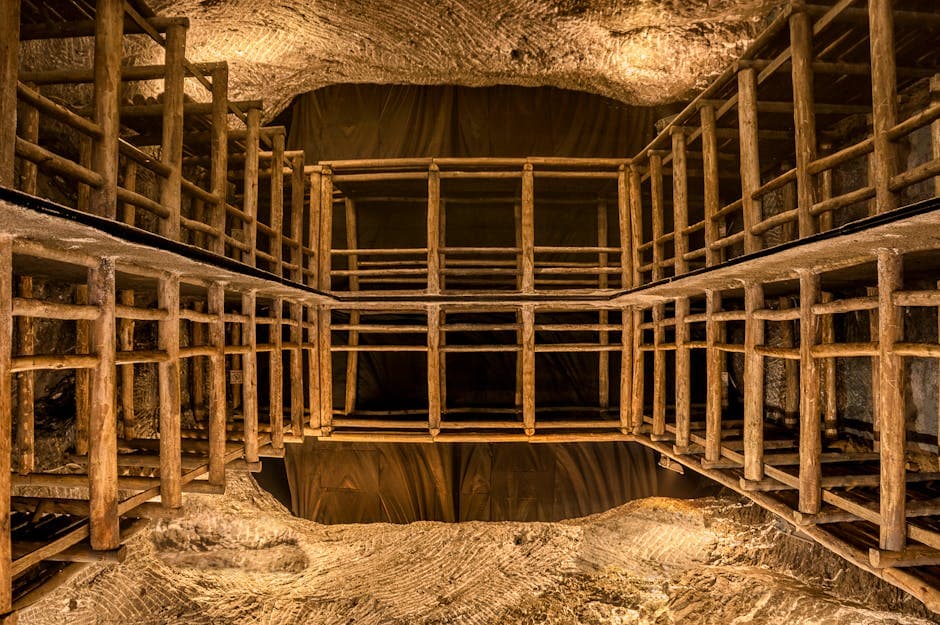 Wooden scaffolding structure inside an underground mine shaft, similar to the supports that early Oak Island excavators would have built as they dug deeper into the Money Pit